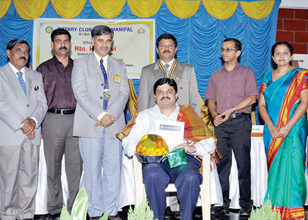Felicitated by Rotary Club Udupi-Manipal in 2012